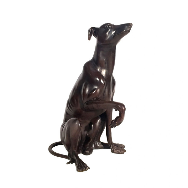 Sitting Dog Bronze Statue Garden Sculpture has paw up leg soulful pose